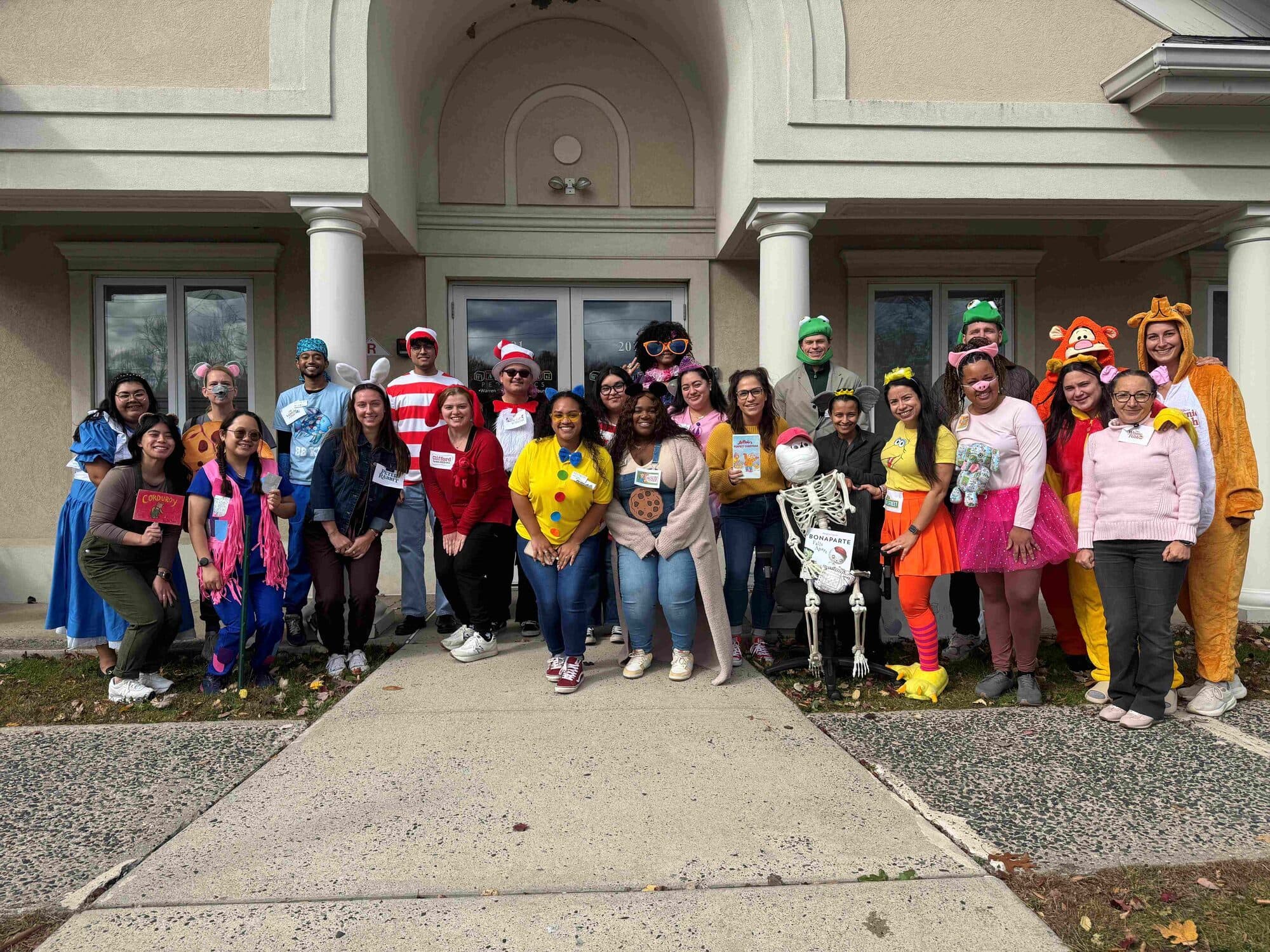 Warren office staff in Halloween costumes, 2025