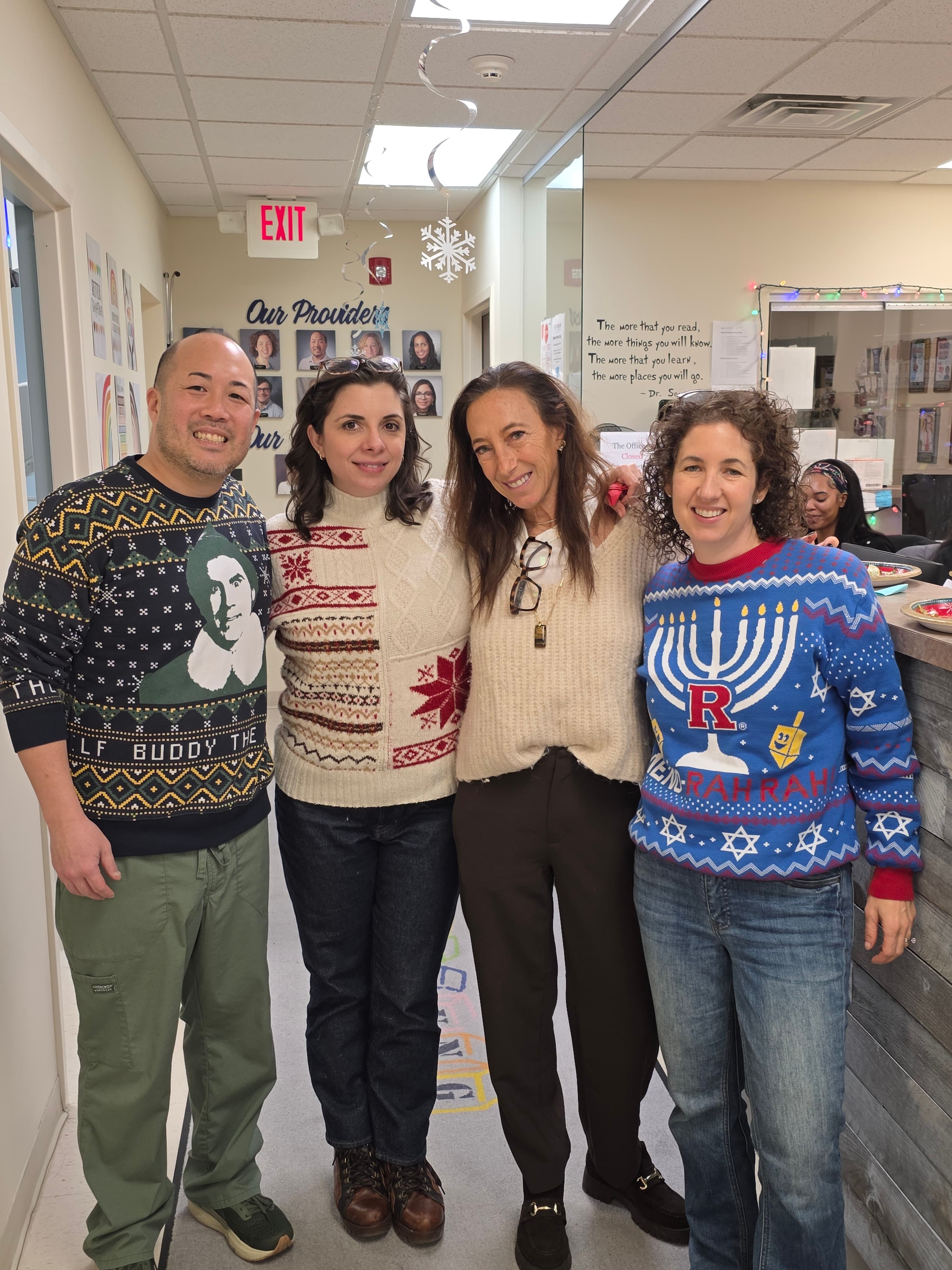 Millburn providers in holiday sweaters