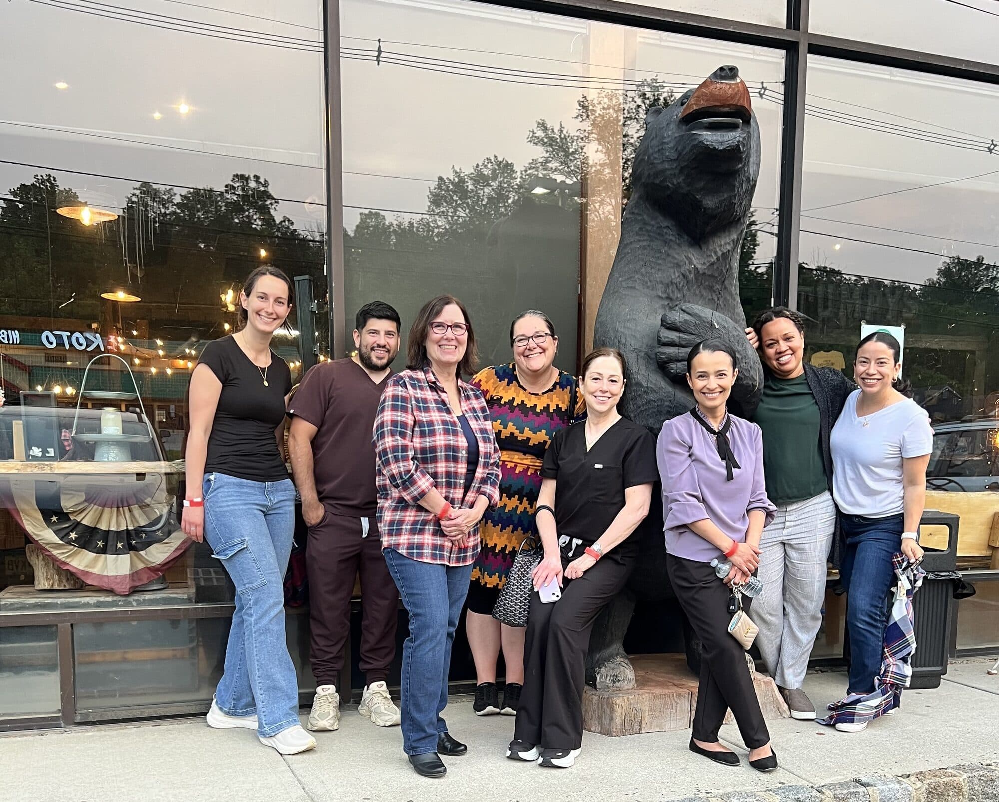 Warren providers outing with bear statue